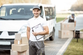 couriers-delivering-parcels-by-car-2025-03-15-07-09-36-utc (1)